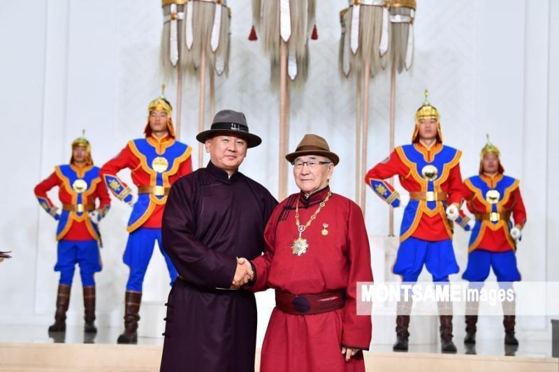 The Order of Chinggis Khaan conferred upon D. Dorjgotov and Jack Weatherford